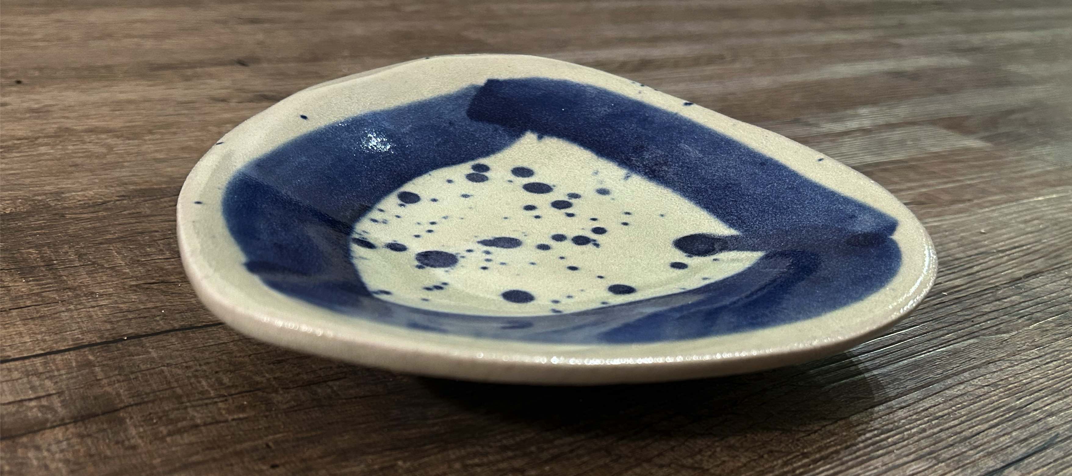 Handcrafted Ceramic Plate – Blue Abstract Design